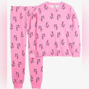 Pair of adult holiday pajamas